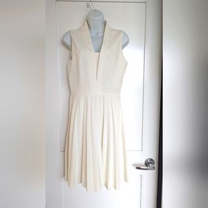 Ivory Pleated skirt dress.